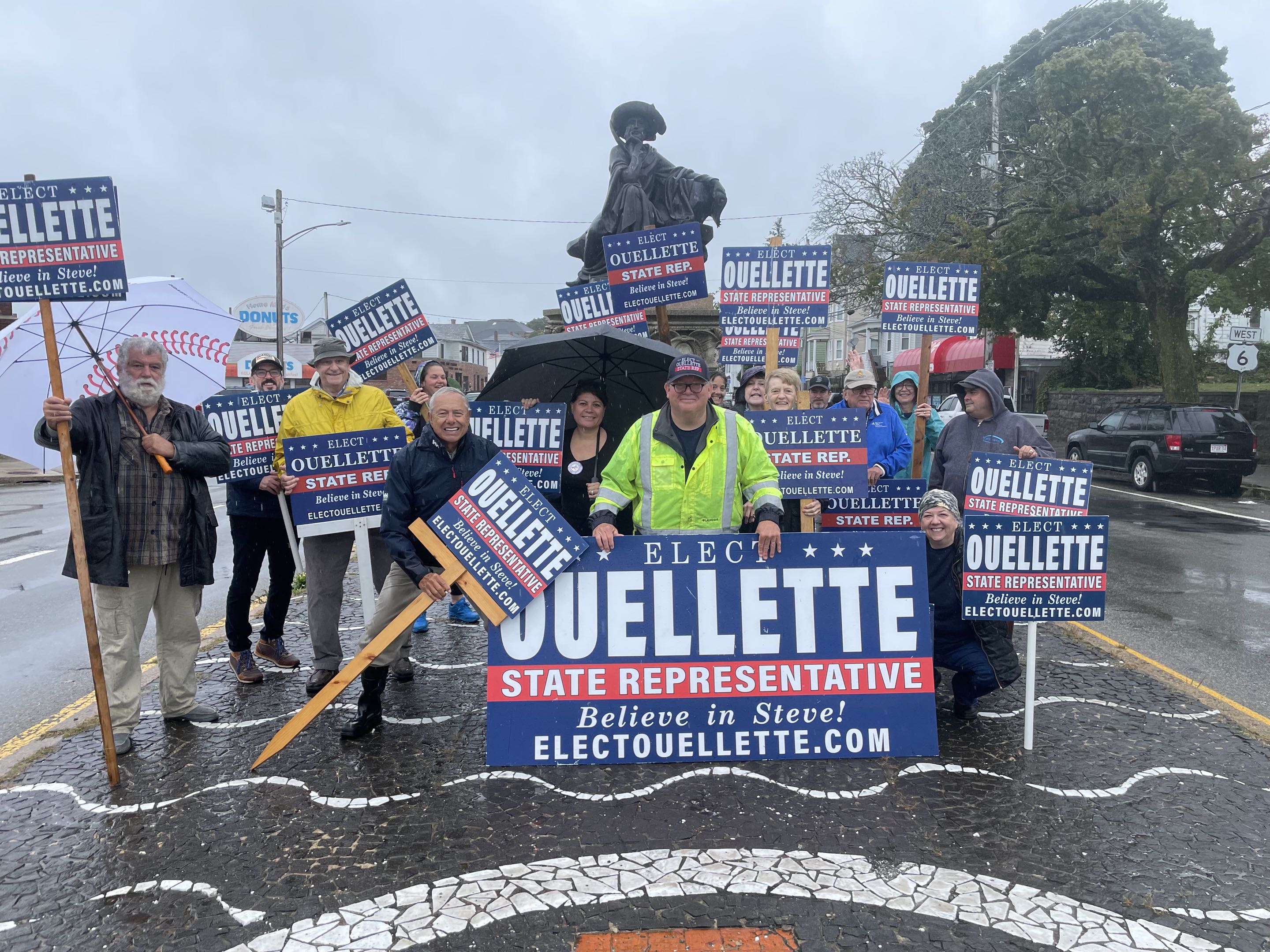 Steve Ouellette outside with a campaign sign